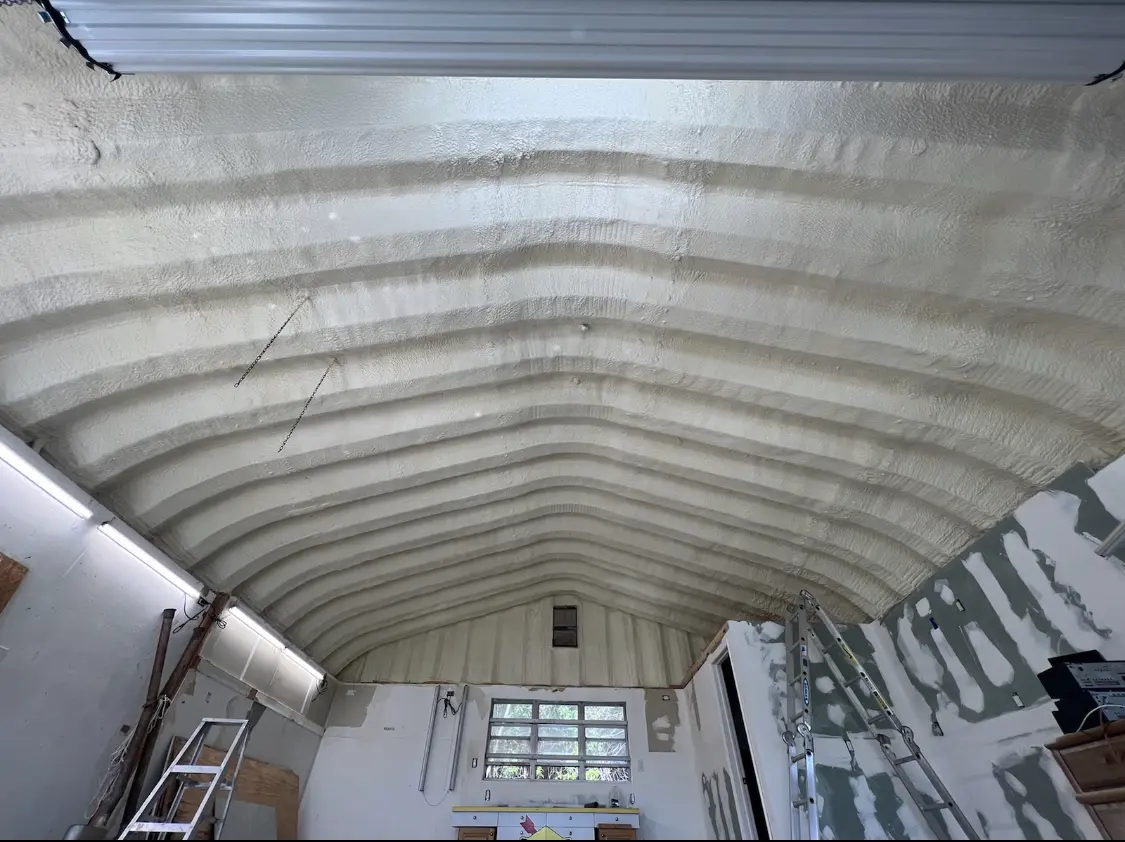 Spray polyurethane foam applied to the underside of a metal roof deck in Rutland